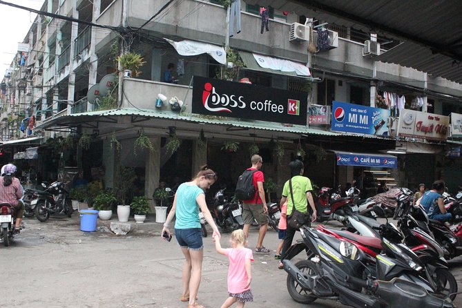 Afternoon Saigon Unseen Adventure by Scooter |Opt: Ao Dai Riders - Your guide, English explanations, and why the stops feel connected