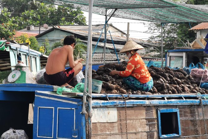 Cai Be Village - One-Day Mekong Delta Adventure - Garden tastings, honey kumquat tea, and southern folk music