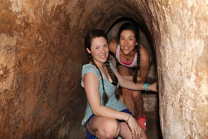 Cu Chi Tunnels Tour from HCM City - Morning or Afternoon - District 1 pickup, air-conditioned rides, and where you’ll be dropped