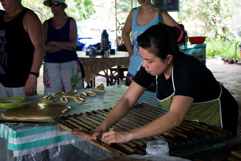 Essential Mekong Delta: Highlight Tour from Ho Chi Minh City - Tan Thạch canals: the slower boat ride on a hand-rowed sampan