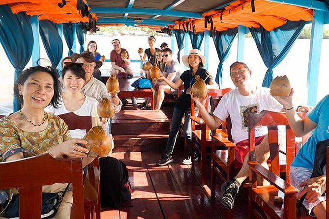 From HCM City: Mekong Delta Tour with Sampan Journey - Ben Tre and the coconut area: lunch in an orchard plus fruit