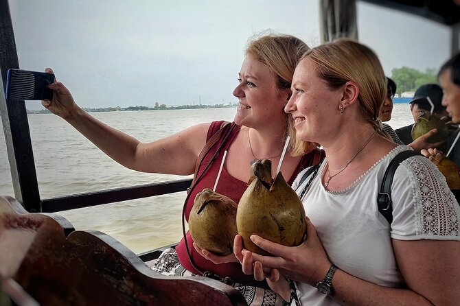 From Ho Chi Minh City: Discover Mekong Delta & Coconut Village - Fruit orchard, folk music, and coconut candy making