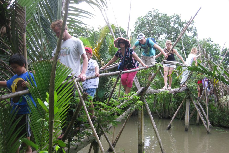 From Ho Chi Minh City: Mekong Delta VIP Tour by Limousine - The village walk: tropical fruit, honey tea, and coconut crafts