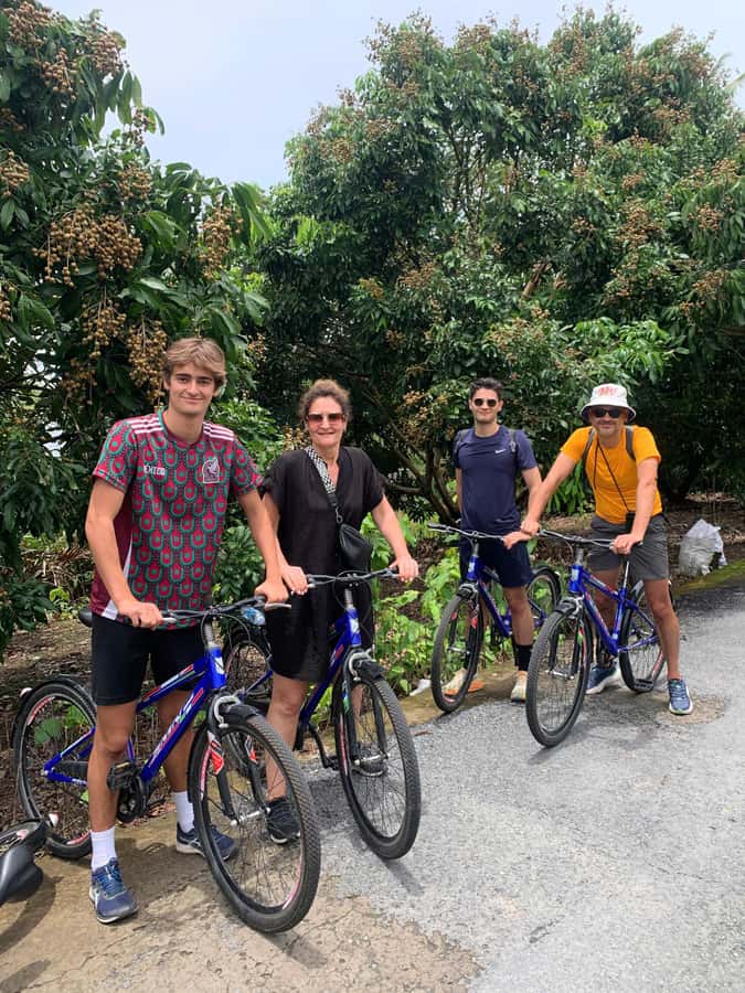 HCM: Authentic Mekong Delta - Boat, TukTuk, Khot Cake Making - Bánh khọt cooking class and Southern folk music that feels tied to place