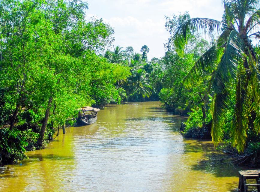 HCM: Cu Chi Tunnels & Mekong Delta with Coconut Village Tour - Sampan Ride Through Coconut Canals and the Coconut Village Experience