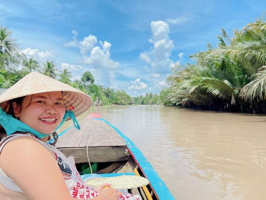 Ho Chi Minh City: Discover Mekong Delta & Coconut Village - Coconut-tree canals by sampan: slow travel that feels personal