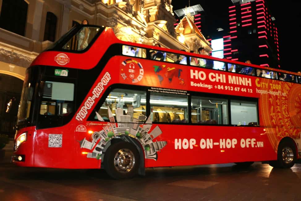 Ho Chi Minh City: Late-Night Open-Top Bus Tour - Route Loop: District 1 to Ba Son Bridge and Back via District 3
