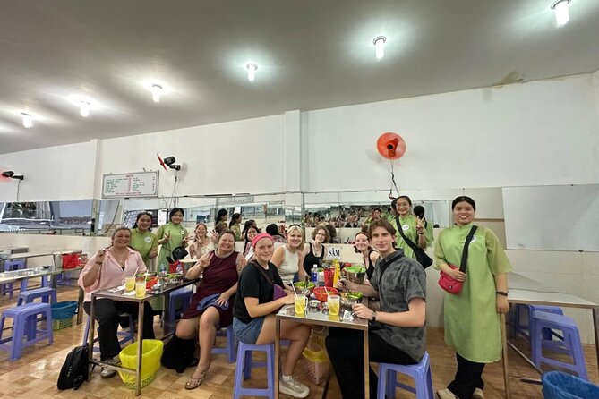 Ho Chi Minh City: Motorbike Street Food Tour with 12 Tastings - The iconic-bite stop: bánh mì and spring rolls in focus