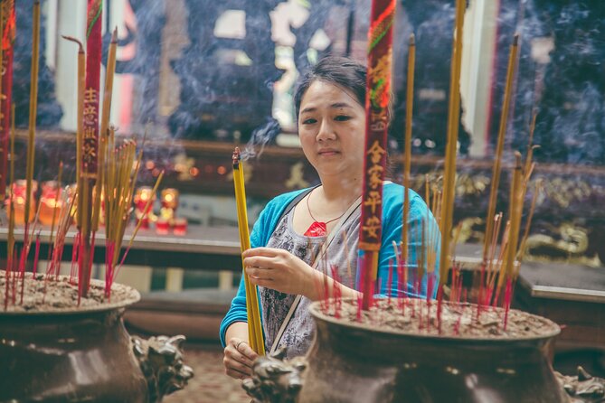 Ho Chi Minh City Motorbike Tour with Student | Saigon Adventure - The Unseen stops: monuments, old apartments, and real-market color
