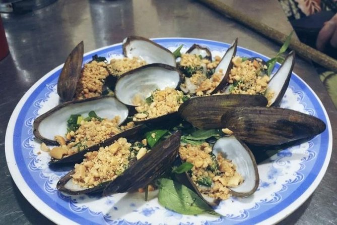 Ho Chi Minh City: Street Food Walking Tour with 12 Tastings - Stop 1: first bites and drinks to set the tone