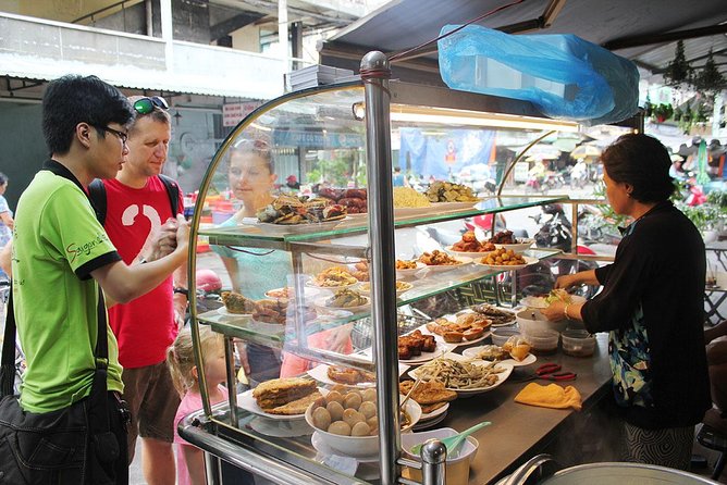 Ho Chi Minh City: Street Food Walking Tour with 12 Tastings - Stop 3: Bánh mì and spring rolls for the classic hit
