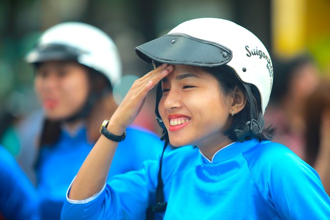 Ho Chi Minh City Tour by Motorbike with Female Riders | KissTour - Thich Quang Duc Monument: quiet weight at a busy intersection