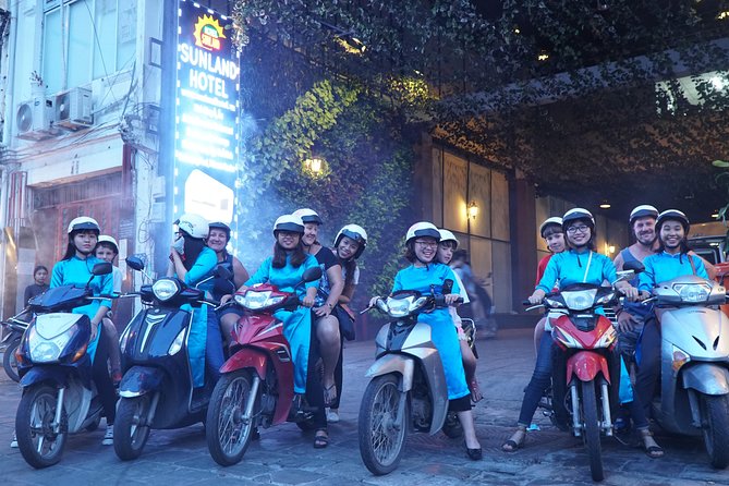Ho Chi Minh Night Tour by Motorbikes with Female Rider | KissTour - Guides in Ao Dai: English-Friendly Stories and Confident Riding