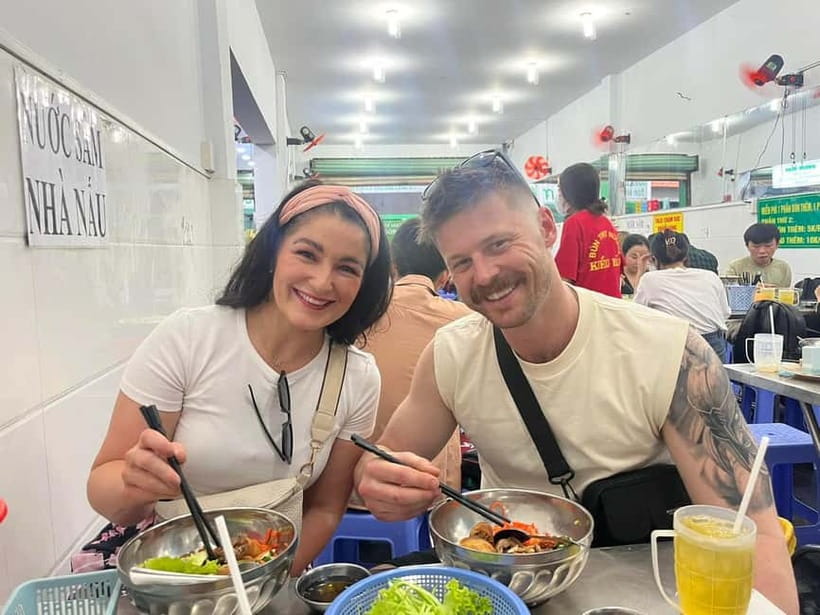 Ho Chi Minh: Street Food & Sightseeing Tour with Local Guide - Saigon flower market + bold snacks that surprise your taste buds