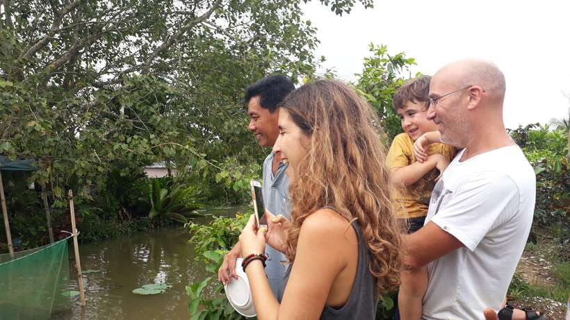 Mekong Day Tour by Car:Cai Be market, Local Island & Cycling - Sampan ride through narrow canals: the closest you’ll get to Delta calm