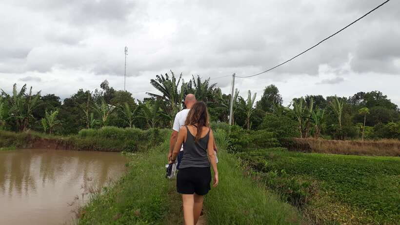 Mekong Day Tour by Car:Cai Be market, Local Island & Cycling - Lunch at a local house: home-cooked flavors and a garden break