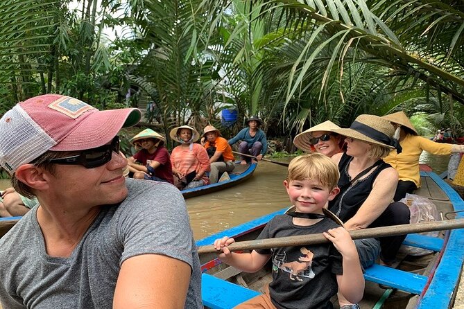 PRIVATE Mekong Delta 1 Day with Kayaking, Biking & Cooking - Bee farm honey tea and Southern music in the coconut-candy zone