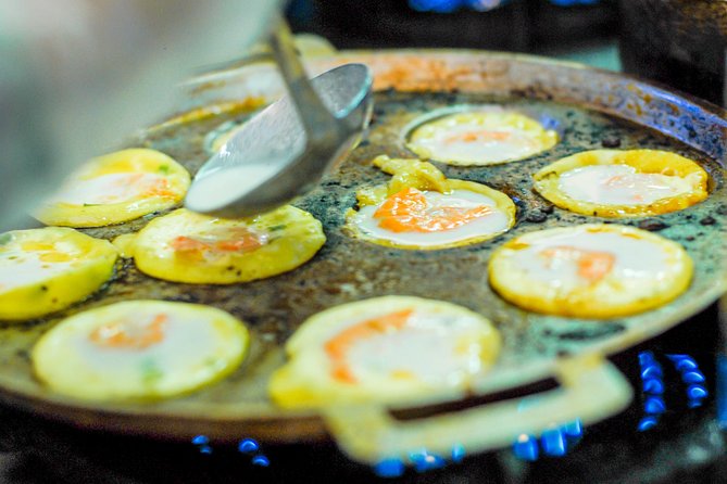 Private Street Food Motorbike Tour in Ho Chi Minh City - District 5 coconut sweets: a dessert stop you’ll remember
