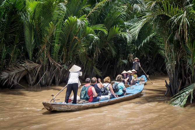 Private Tour to Explore Cu Chi Tunnels and Mekong Delta - Coconut candy mill and honey tea: snacks with a local rhythm