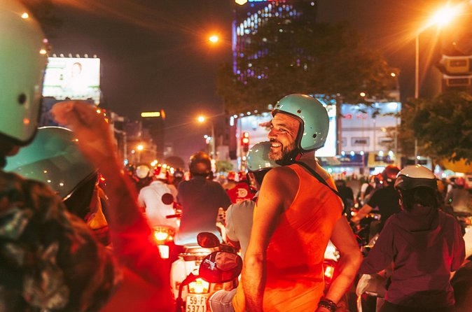 Saigon After Dark Night Tour by Scooter + 7 tastings - Stop 2: Ho Thi Ky Flower Market and the crispy banana cracker lesson