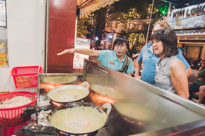 Saigon After Dark Night Tour by Scooter + 7 tastings - Stop 3: Nguyen Thien Thuat apartment-building street food lanes
