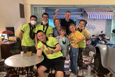 Saigon By Night and Street Food By Motorbike | Opt: Ao Dai Riders - Pickup at 5:30, then the ride setup: helmets, ponchos, and Ao Dai riders
