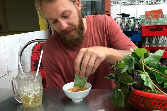 Saigon By Night and Street Food By Motorbike | Opt: Ao Dai Riders - Stop 3: Nguyen Trãi Street for shopping chaos (and a quick culture reset)