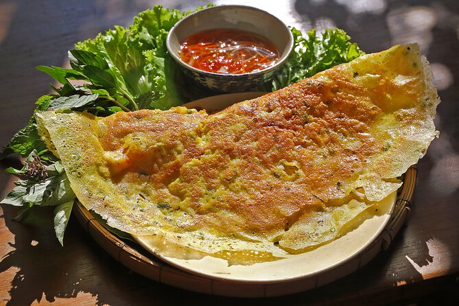 Saigon By Night and Vietnam Local Food on Motorbike - Stop 5: Ho Thi Ky Flower Market + Vietnamese Pizza (Grilled Rice Paper) and Dessert