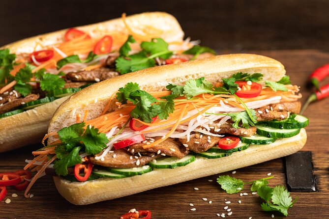 Saigon By Night and Vietnam Local Food on Motorbike - Stop 1: Bánh Mì and First-Strike Street Food Energy