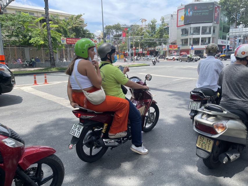 Saigon: City Unseen Highlights 2h Tour | Opt: Ao Dai Riders - Safety, Helmets, and the Reality of Scooter Riding