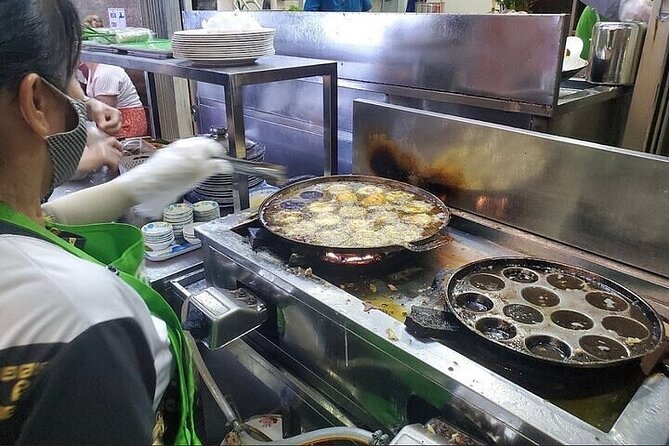 Saigon Evening Walking Street Food Tour - Dessert at the night flower market: coconut ice cream and avocado options