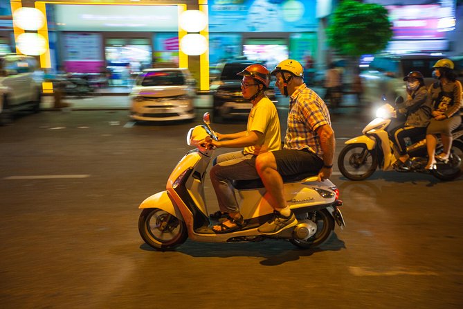 Saigon Night Street Food and City Tour on Scooter - Stop for Vietnamese pancakes: your first bite of Saigon