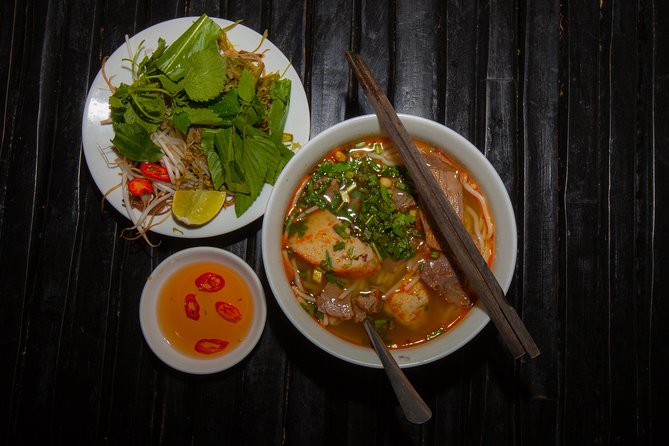Saigon Night Street Food and City Tour on Scooter - The noodle-soup stop: comfort food with choices