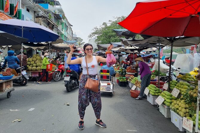 Saigon Private/Small Group Walking Food Tour with 13 Tastings - Ho Thi Ky Flower Market: grilled rice paper, snails, and sugarcane juice