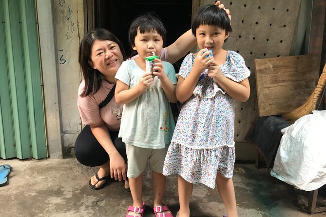Saigon Slum tour and Saigon Chillspots by motorbike/ Aodai rider - Rush Saigon vs the standard 2–4 hour tour