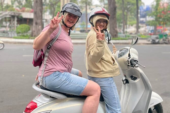 Saigon Unseen, History, & Hidden Gems Sightseeing Motorbike Tour - Getting on the scooter: safety, helmets, and how the day starts