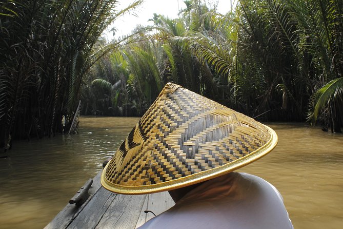 Shared Cu Chi Tunnels & Mekong Delta Tour Full Day - Lunch, fruit tastings, and the honey tea moment