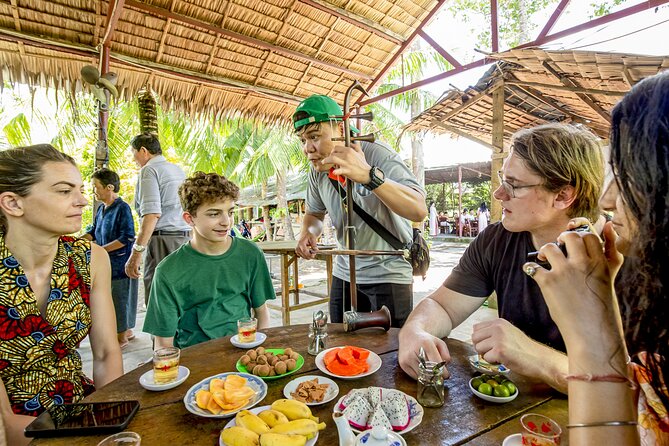 Small-Group Mekong Delta Day Trip: Boat Ride, Cottages & Pagoda - Ben Tre and coconut country: workshops, honey, and tastings