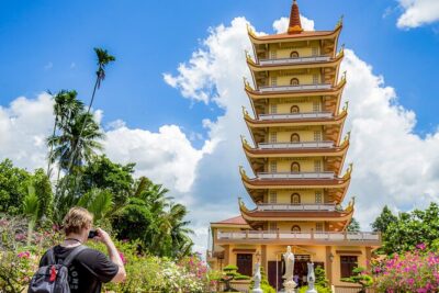 Small-Group Mekong Delta Day Trip: Boat Ride, Cottages & Pagoda - Cruising the Mekong: motorboat canals, Rạch Miễu Bridge, and real river life