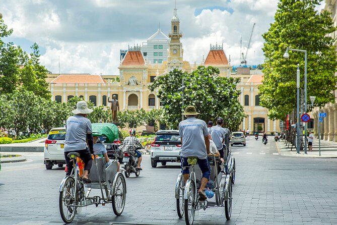 Small-group Saigon City Tour: 1-day Must-See Icons & Cyclo Ride - Ben Thanh Market: souvenirs, snacks, and your last local stop