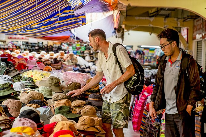 Small-group Saigon City Tour: 3-Hour Cyclo Ride to Hidden Stories - Stop 3: Binh Tay Market—buying, architecture, and the real Saigon feel