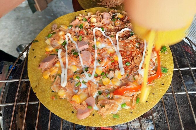Super Niche Walking Street Food Tour in Ho Chi Minh City - Ho Thi Ky Flower Market: Wholesale Scale With a Food-Lover Lens