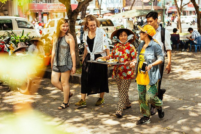The 10 Tastings of Ho Chi Minh City With Locals: Private Street Food Tour - Turtle Lake: history, shade, and a local snack moment