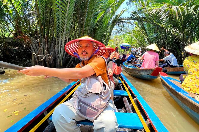 VIP Tour: Mekong Delta 1 Day | Option: Better Lunch - Ben Tre by Canal: Coconut Candy and the Boat-Through-Work-Day Feeling